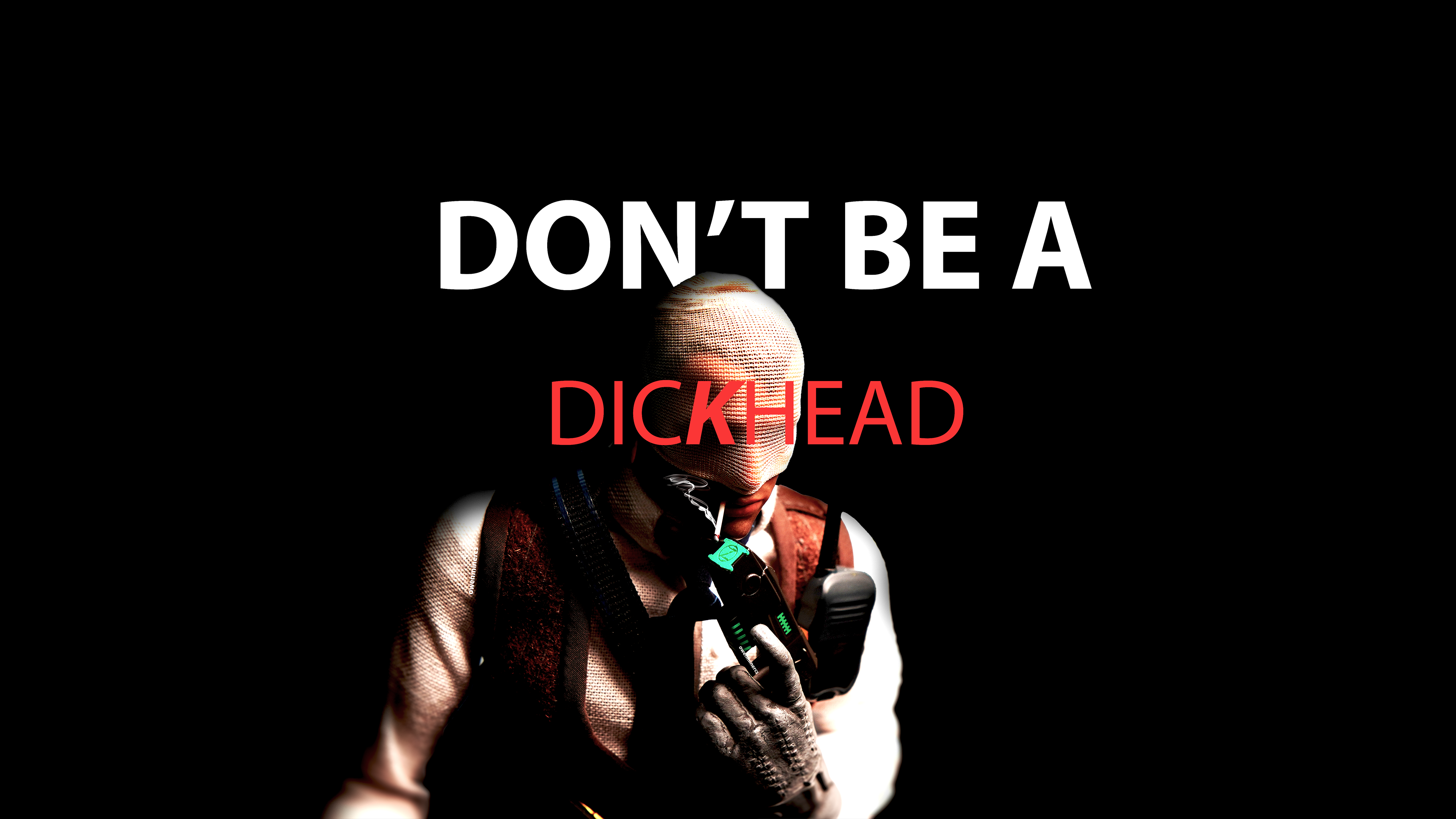 Agent number K figurine with text don't be a dick head. Figurine is holding zues up to light cigarette. Black Background